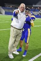 After half a century, coach still on the job, with grandson on the gridiron