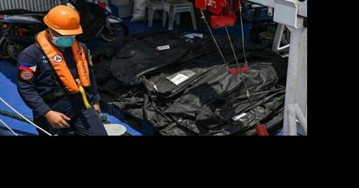Philippine rescuers pull more victims from charred ferry