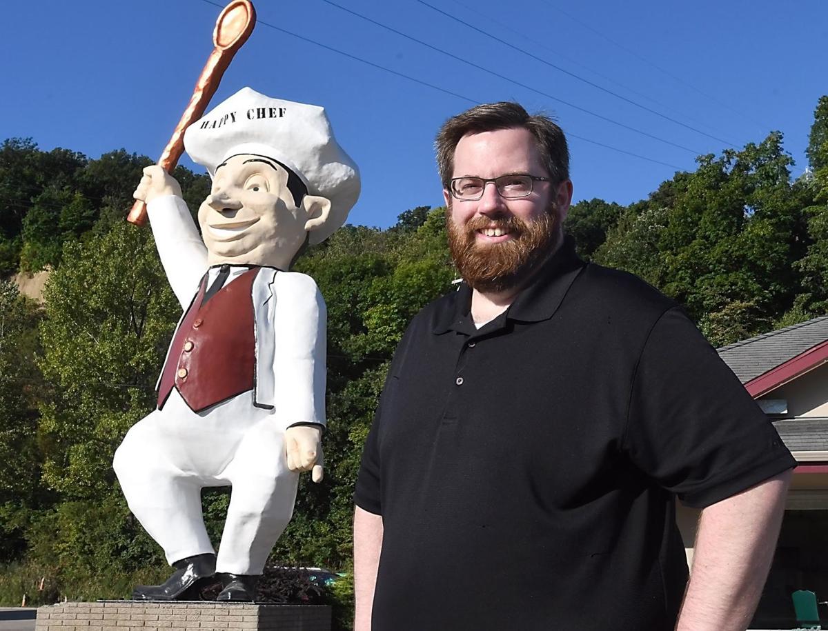 happy chef statue has his voice back