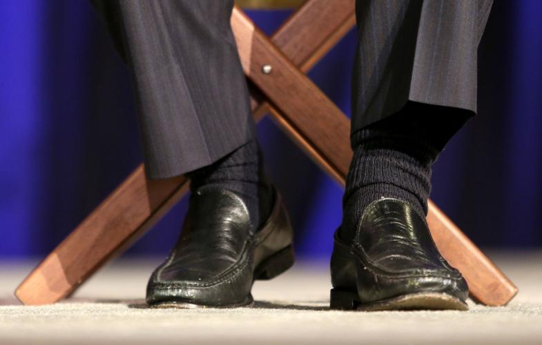 New England Patriots head coach Bill Belichick wears slip on black shoes for his morning press conference.