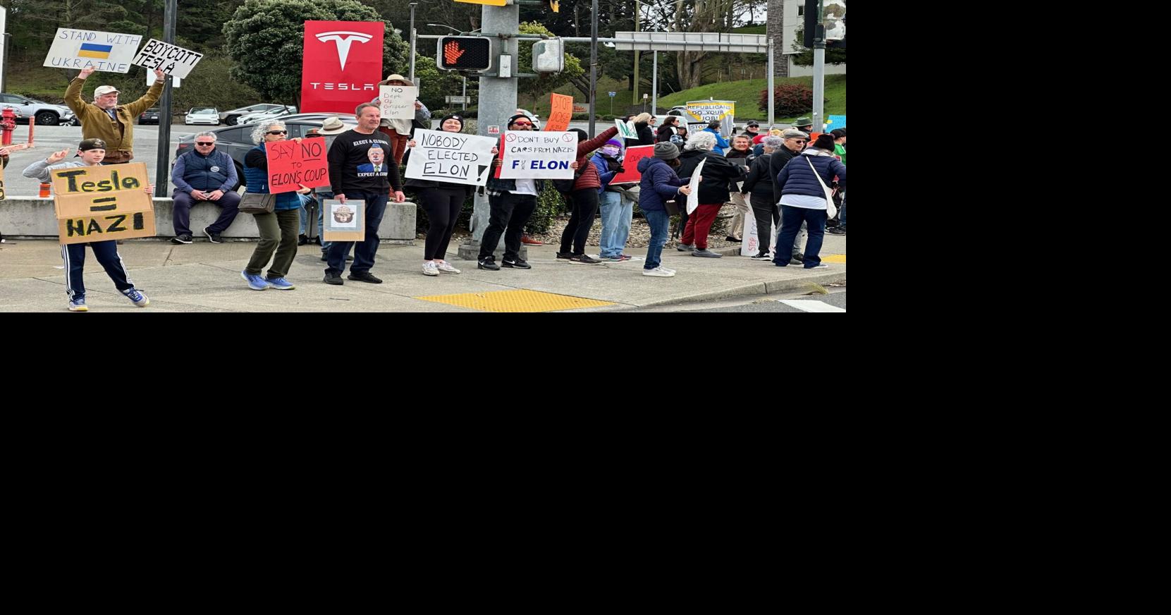 Local group protests at Tesla | News | coastsidenews.com