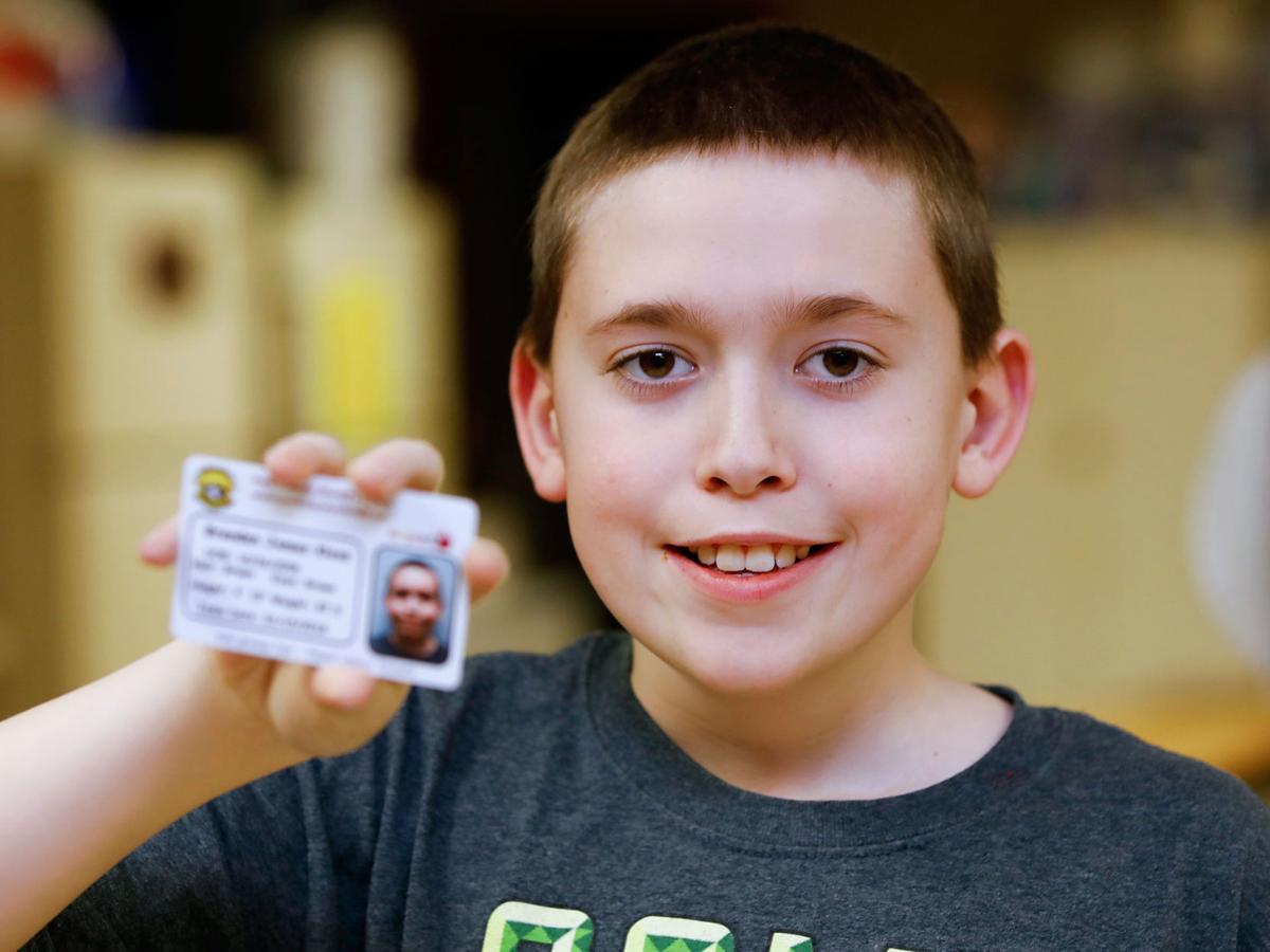 Child safety program uses youth ID cards People