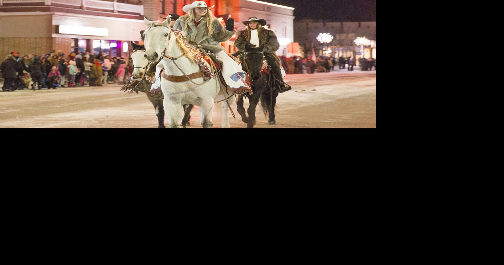 Cody cowfolk stroll downtown for lighted parade People
