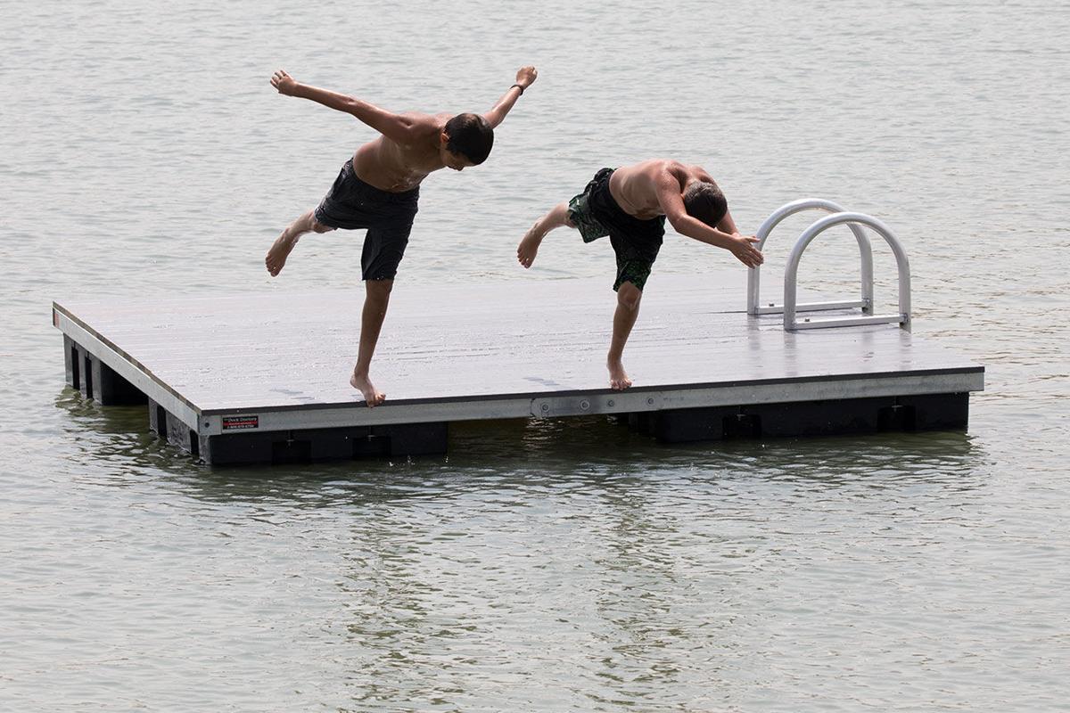 Diving off the new swim dock Local News