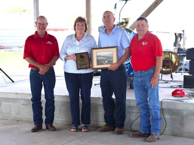 Kaye and Mark Lidolph with Weyand Family Farm Pioneer Award at Butler County Fair