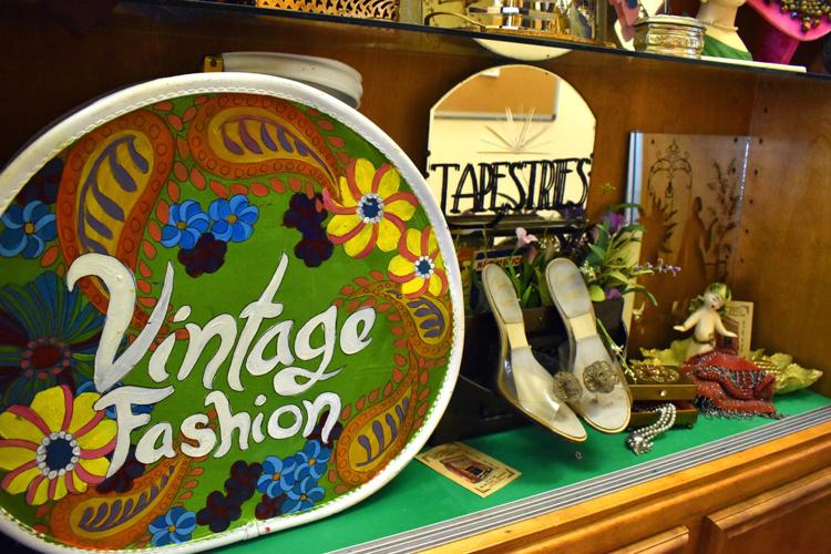 Tapestries displays fashion antique items at library