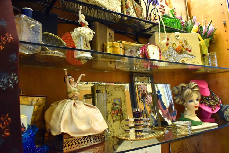 Tapestries displays fashion antique items at library