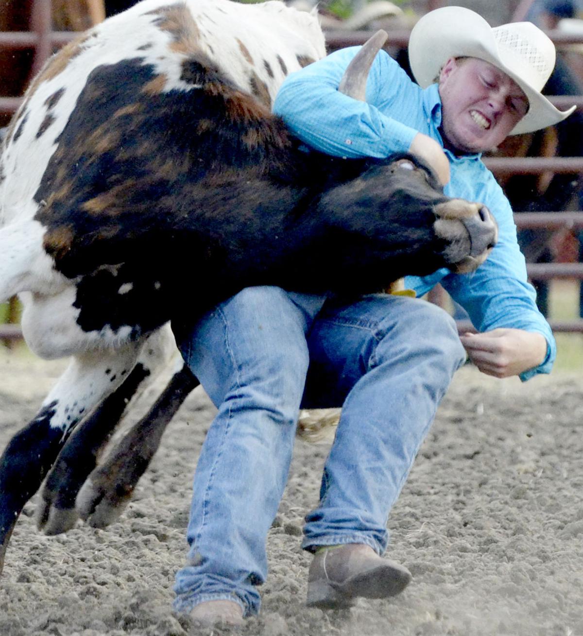Rodeo ropes in fatherson team Local