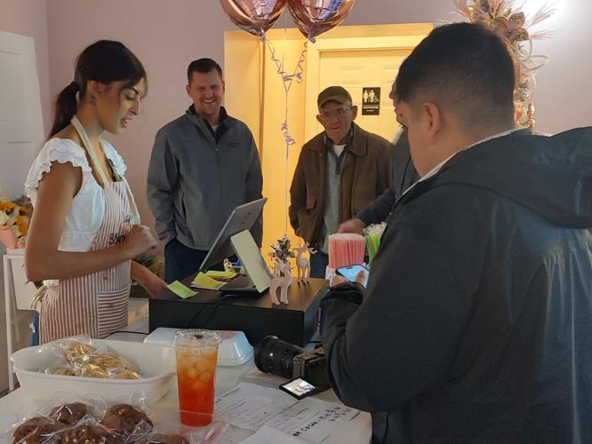 Ribbon-cutting customers