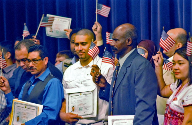 Ceremony ends journey for 55 new US citizens