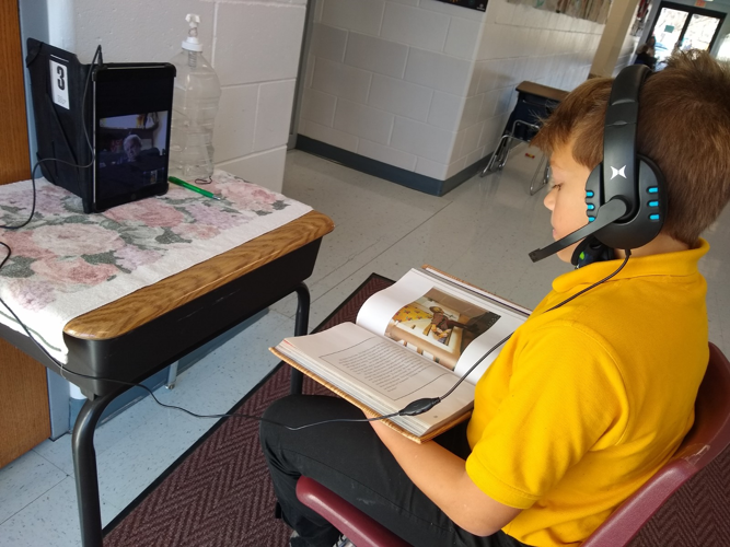 Elementary students read over Zoom