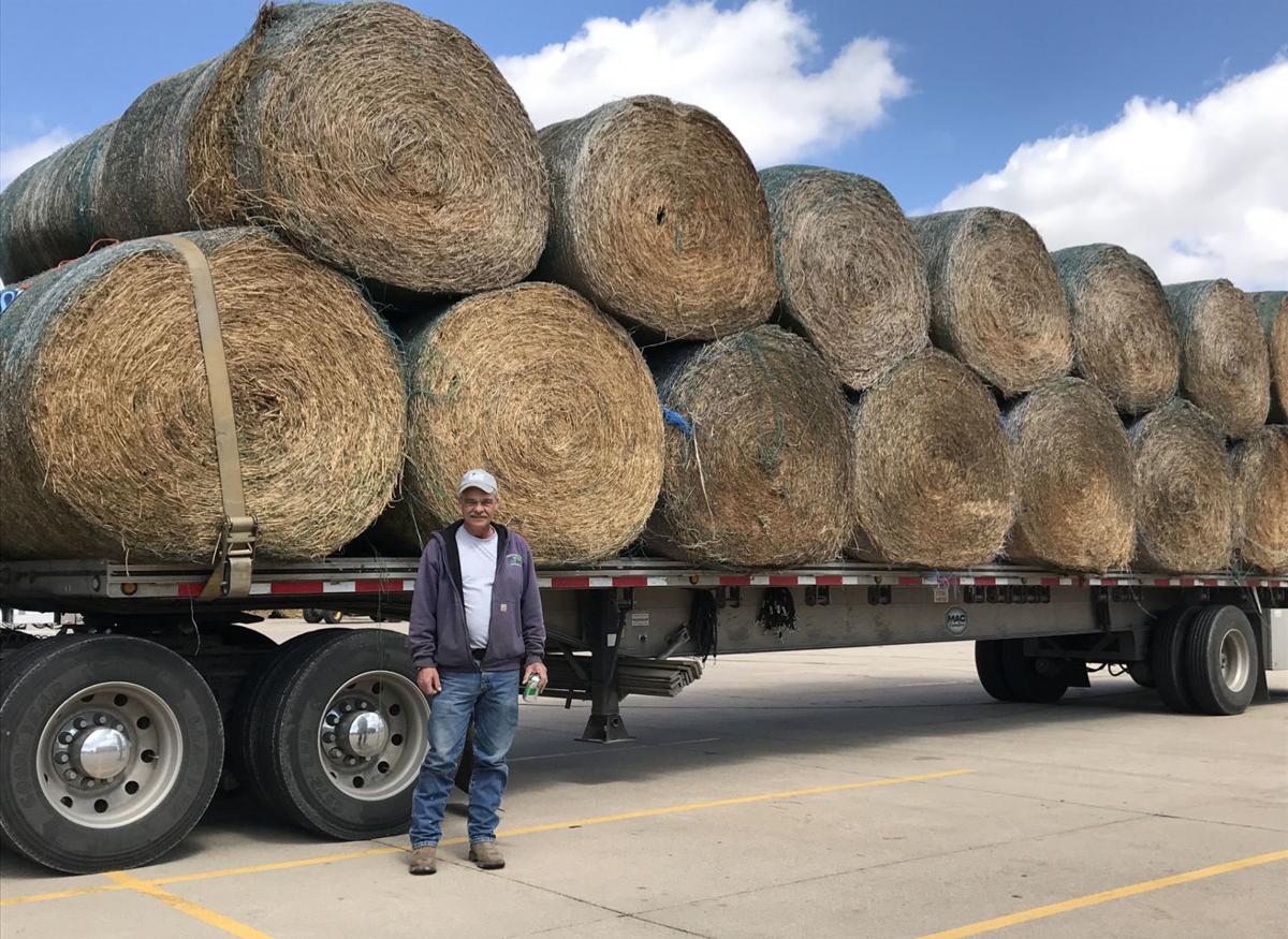 Truckers Haul In Tons Of Hay To Ag Park To Help Area Producers
