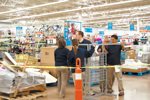 Walmart staff welcomes customers to remodeled Richardson location