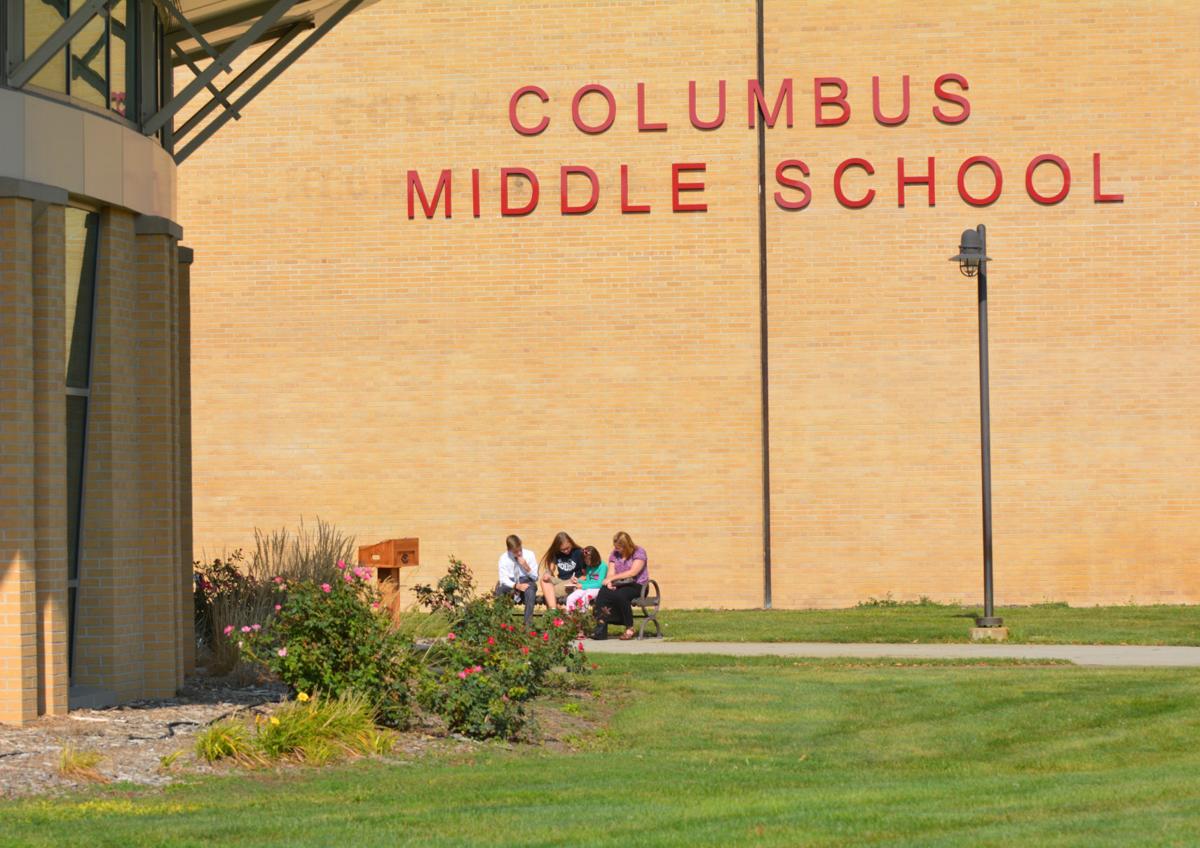 Middle school conversion hits target date Local