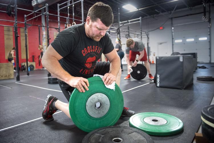 Weightlifter-turned-teacher's challenges will keep you fit during  coronavirus shutdown 