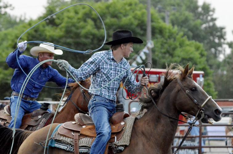 Rodeo ropes in fatherson team
