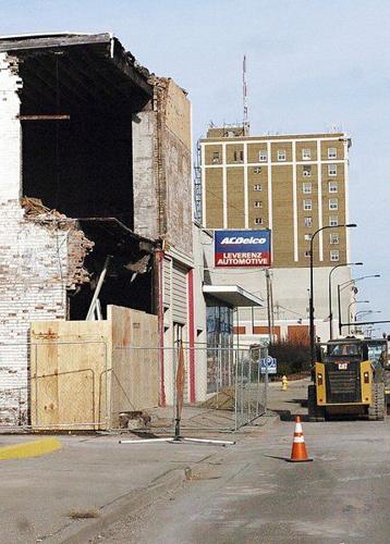 Truck hits building, causes wall to collapse | Local News | commercial ...