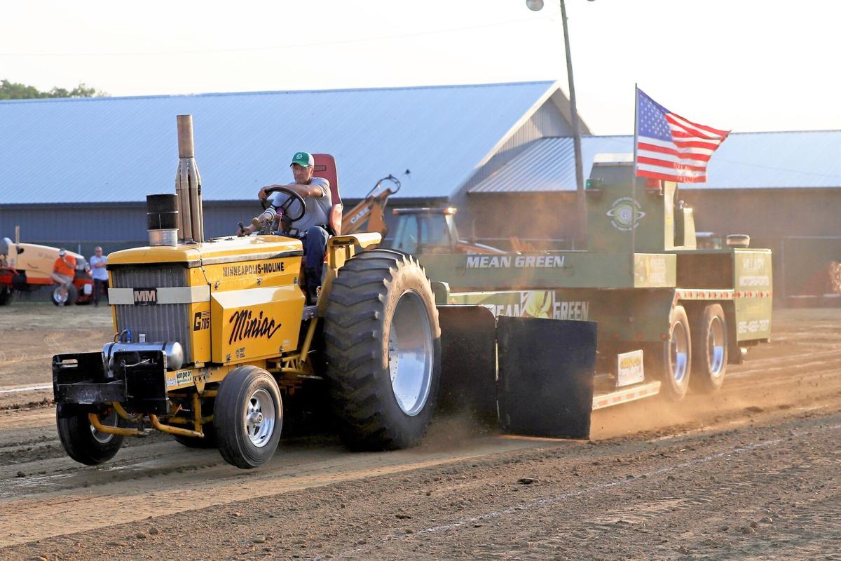 Miniac pulls deep in outlaw tractor pull Sports