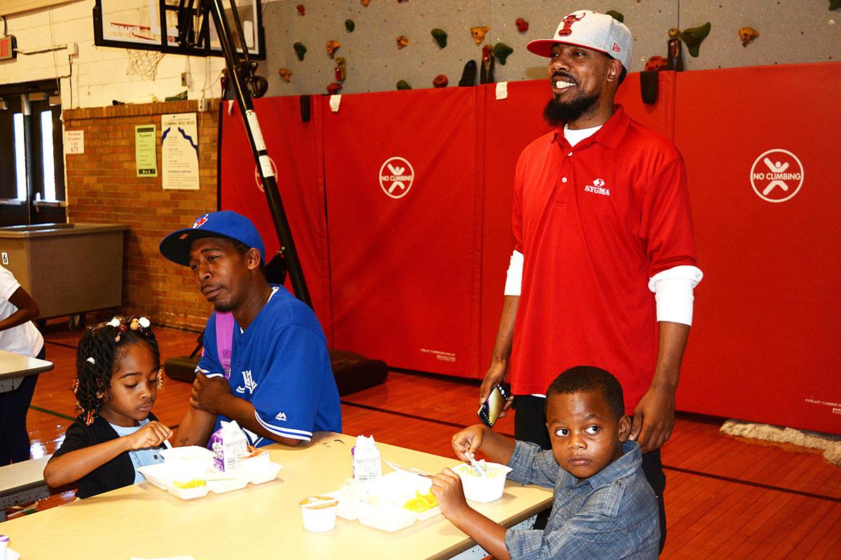 Fathers join children for first day of school