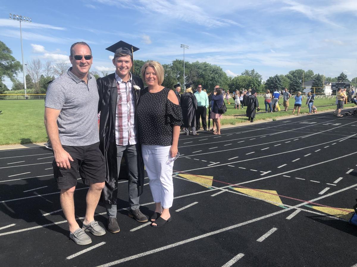 Leonards pose after ceremony