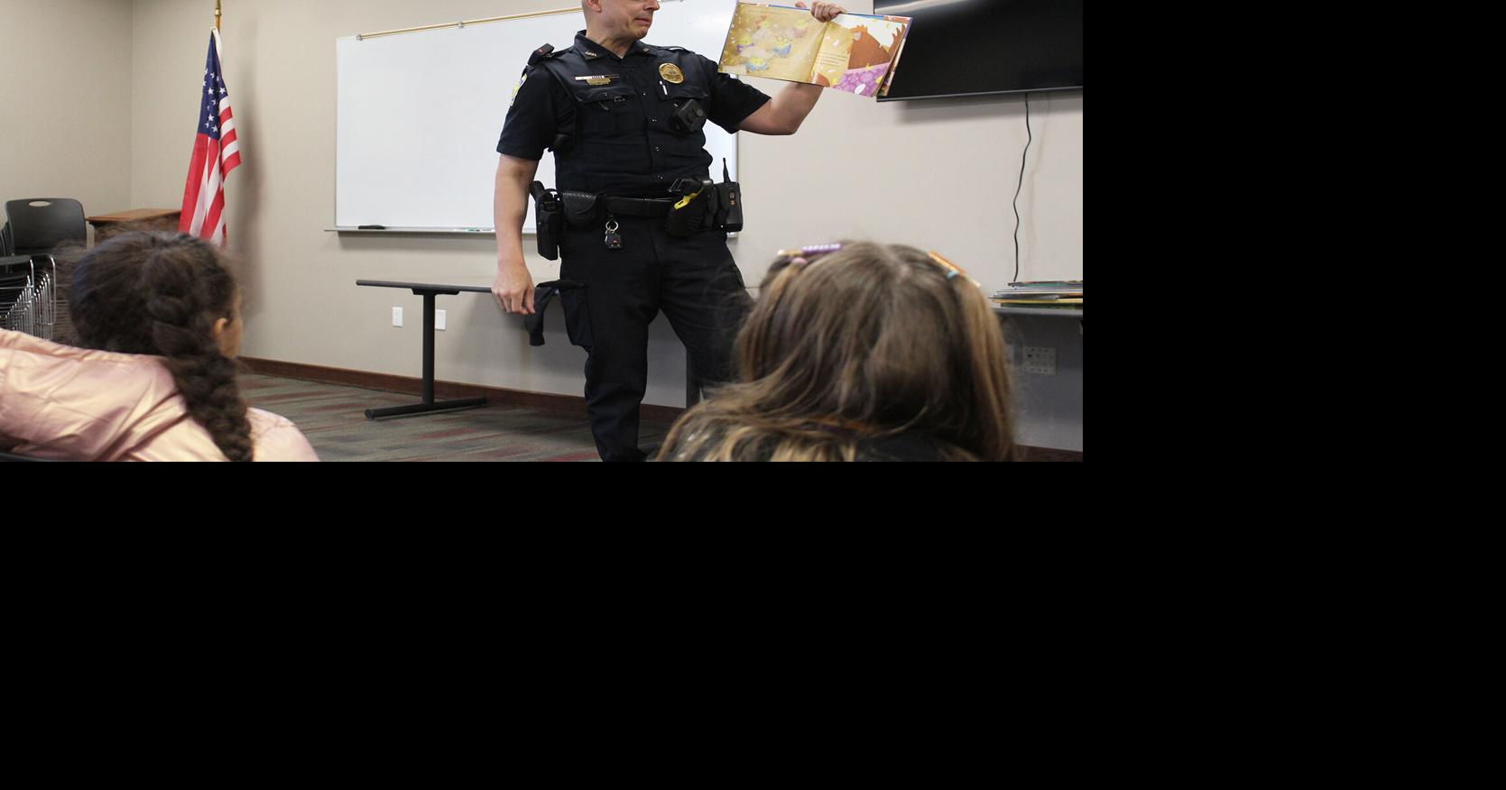 An evening of reading: Oelwein Library hosts Read with a Cop Thursday ...
