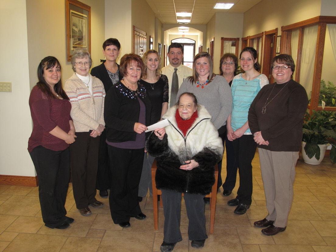 Fidelity Bank & Trust employees donate over 8000 to charities in 2014