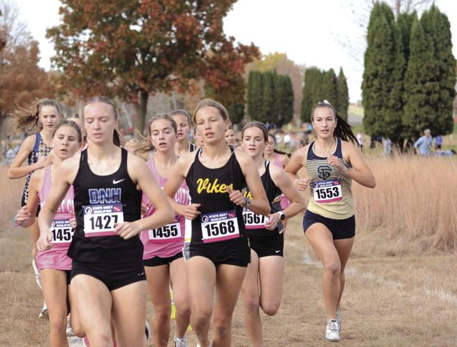 Cougar girls crosscountry wins first district title in program history