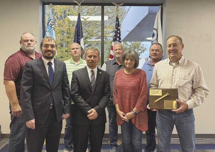 The long, winding trail: Ingels presented Oelwein’s Golden Spike Award ...