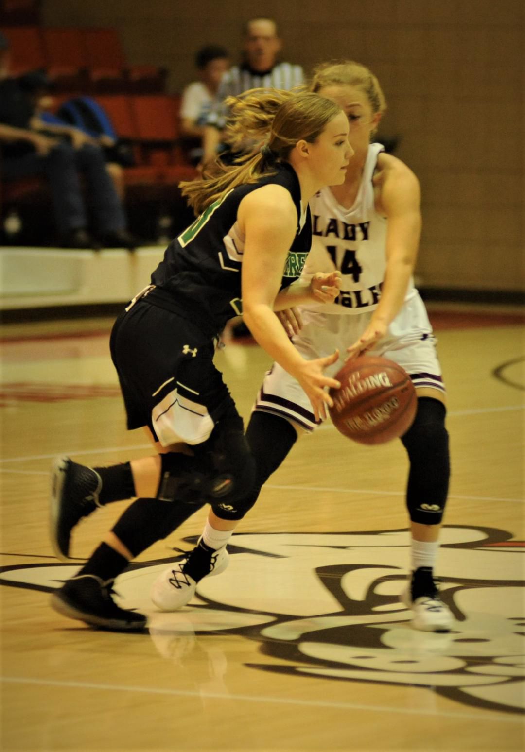Kerens' Kaylee Reed drives against Mildred's Arianna Neason