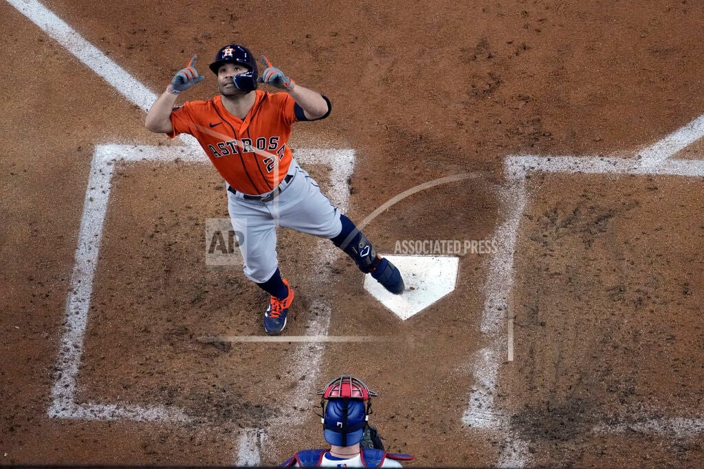 Rookie propels Astros past Braves to tie World Series