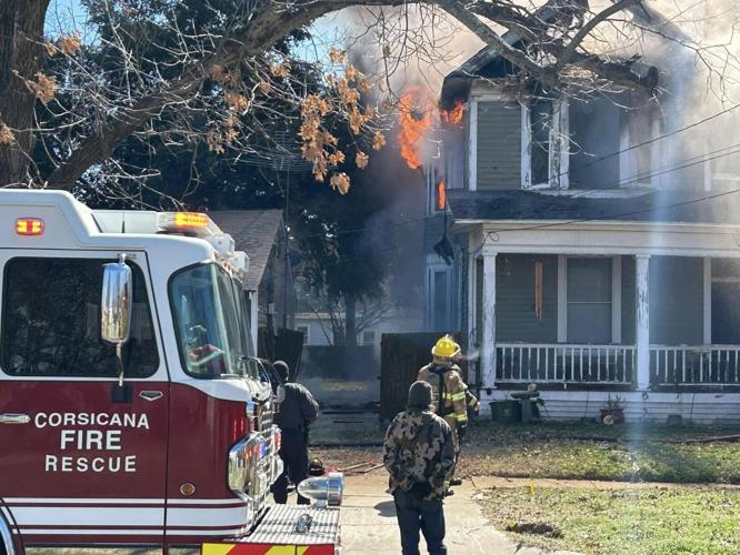 PHOTOS: Carriage District residence catches fire on chilly morning ...