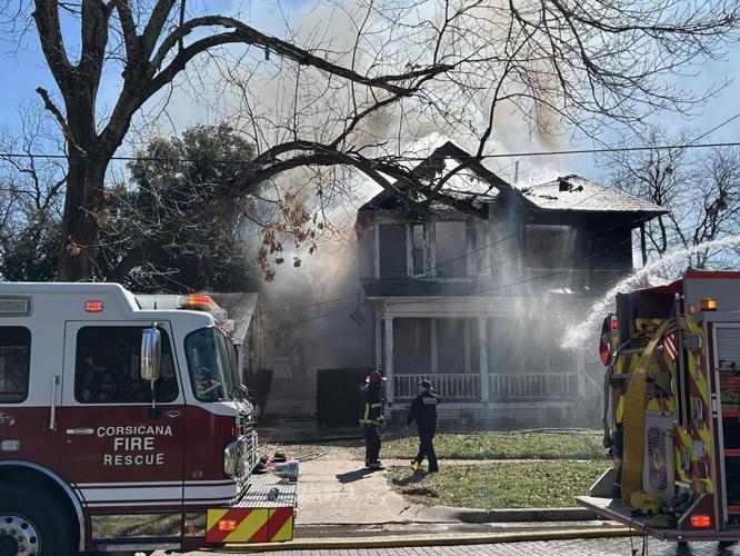 PHOTOS: Carriage District residence catches fire on chilly morning ...