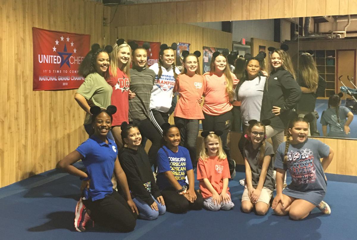 Youth cheer team raising funds for competition News