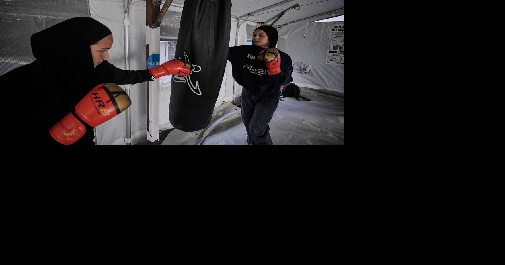 Palestinian girls train at a boxing club in Gaza, in photos