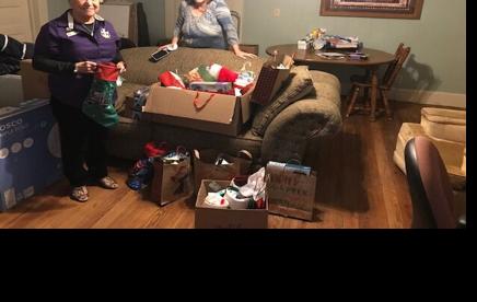 Local organization gives gifts to House of Refuge ...