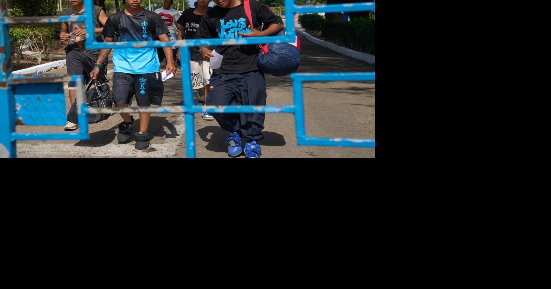 Photos of freed prisoners reuniting with families outside a Cuban prison