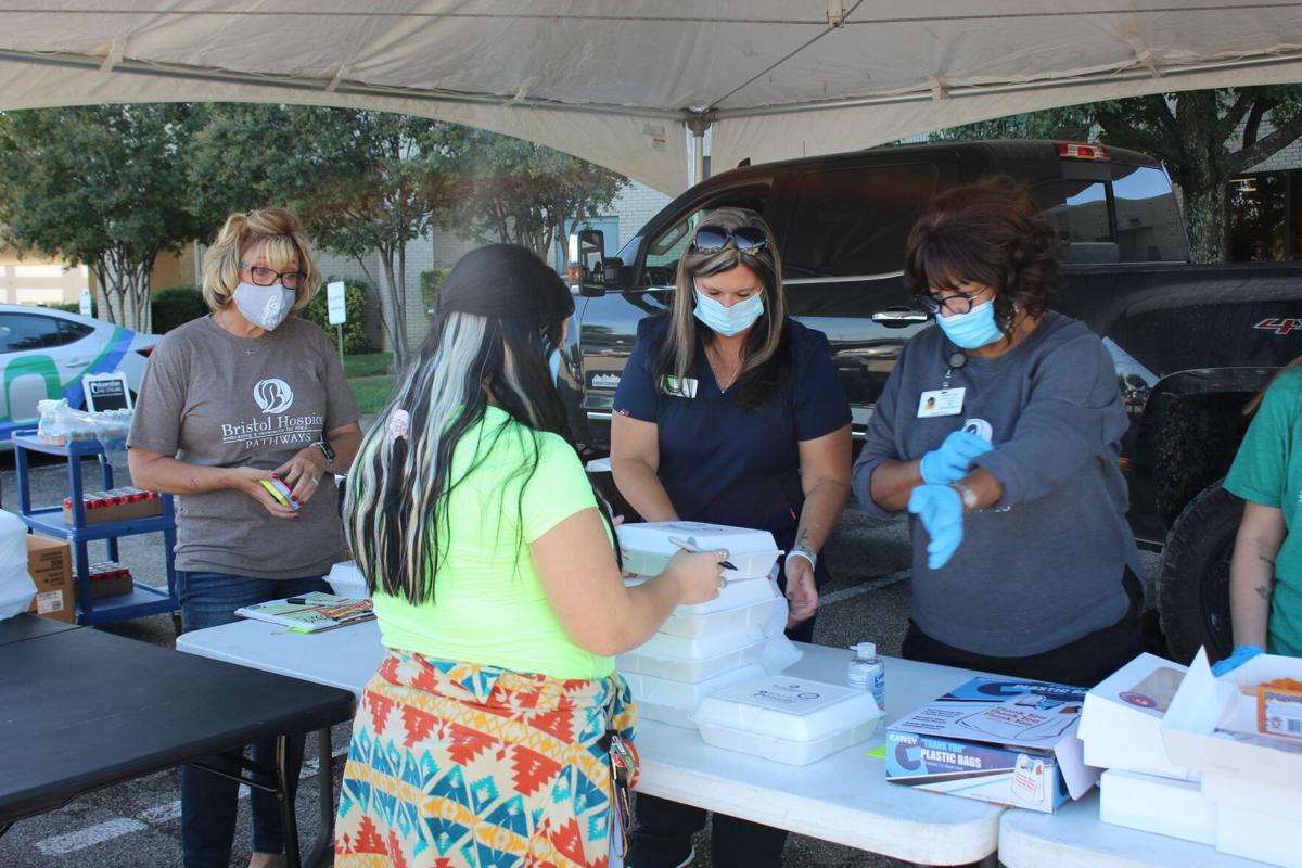 healthcare workers provide lunch for