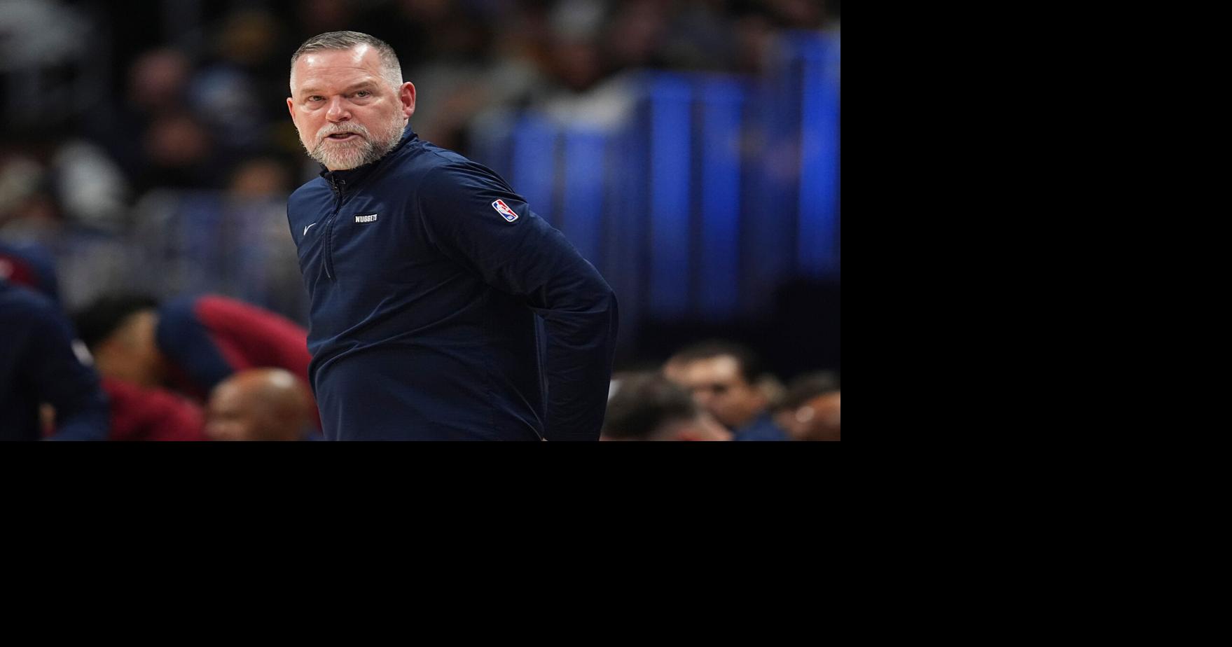 Malone takes over at North Carolina as the Tar Heels turn to an outsider from the NBA