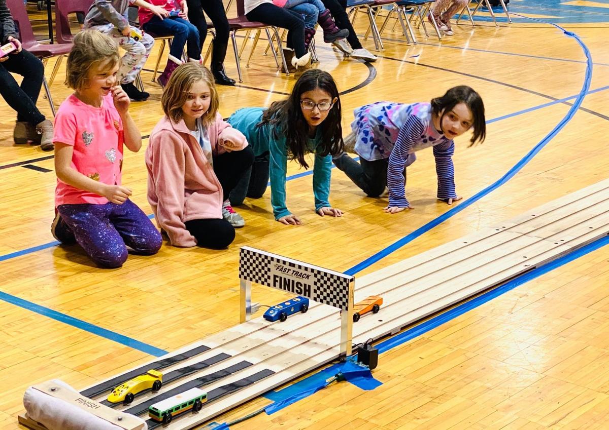 Local Girl Scouts hold first Pinewood Derby Race Woodford Courier