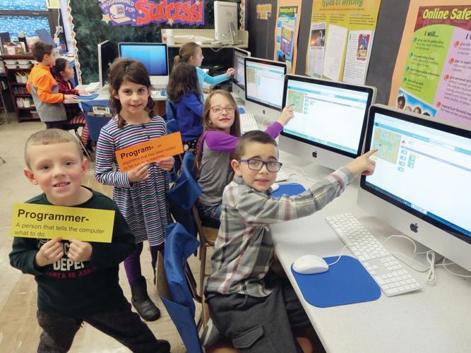 Elementary school students learn computer science skills to end 2017 ...