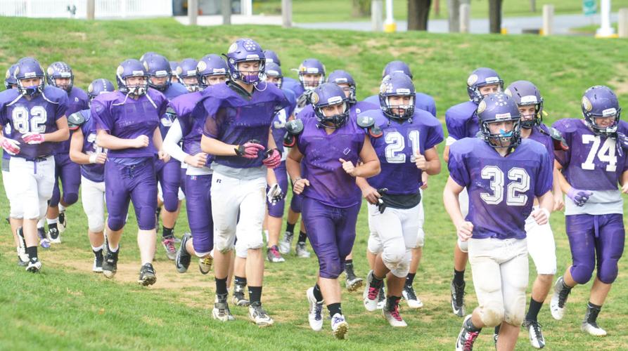 HS Football Local schools weigh in on football helmet discussion