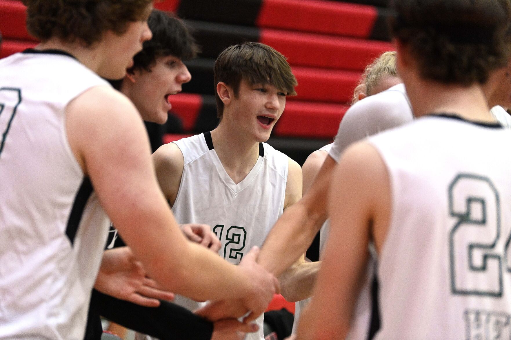 Tim Fletcher takes first serve at organized volleyball with Carlisle's