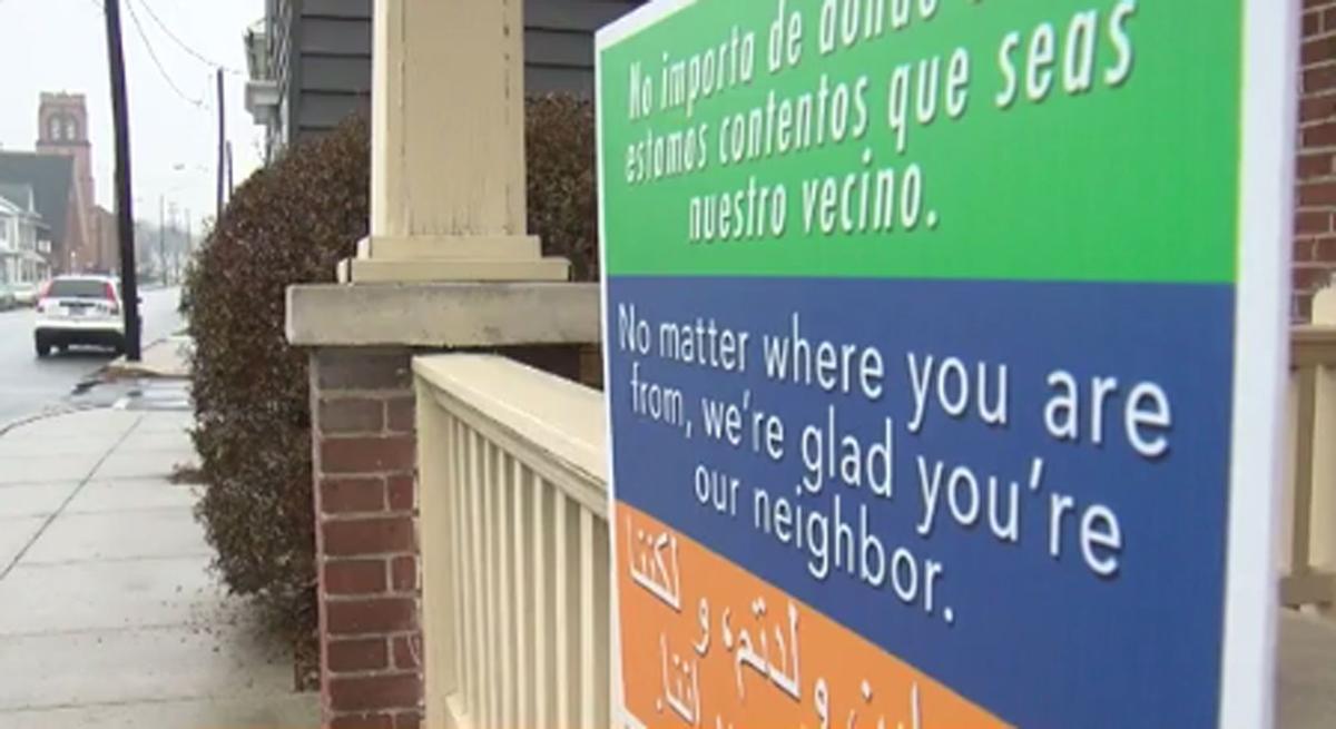Multilingual 'neighbor' signs spread nationwide