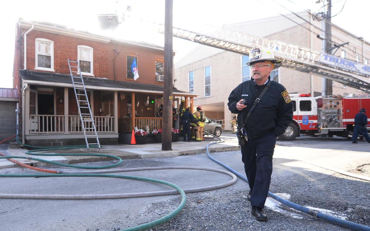 Crews battle frigid temperatures to contain house fire in Carlisle