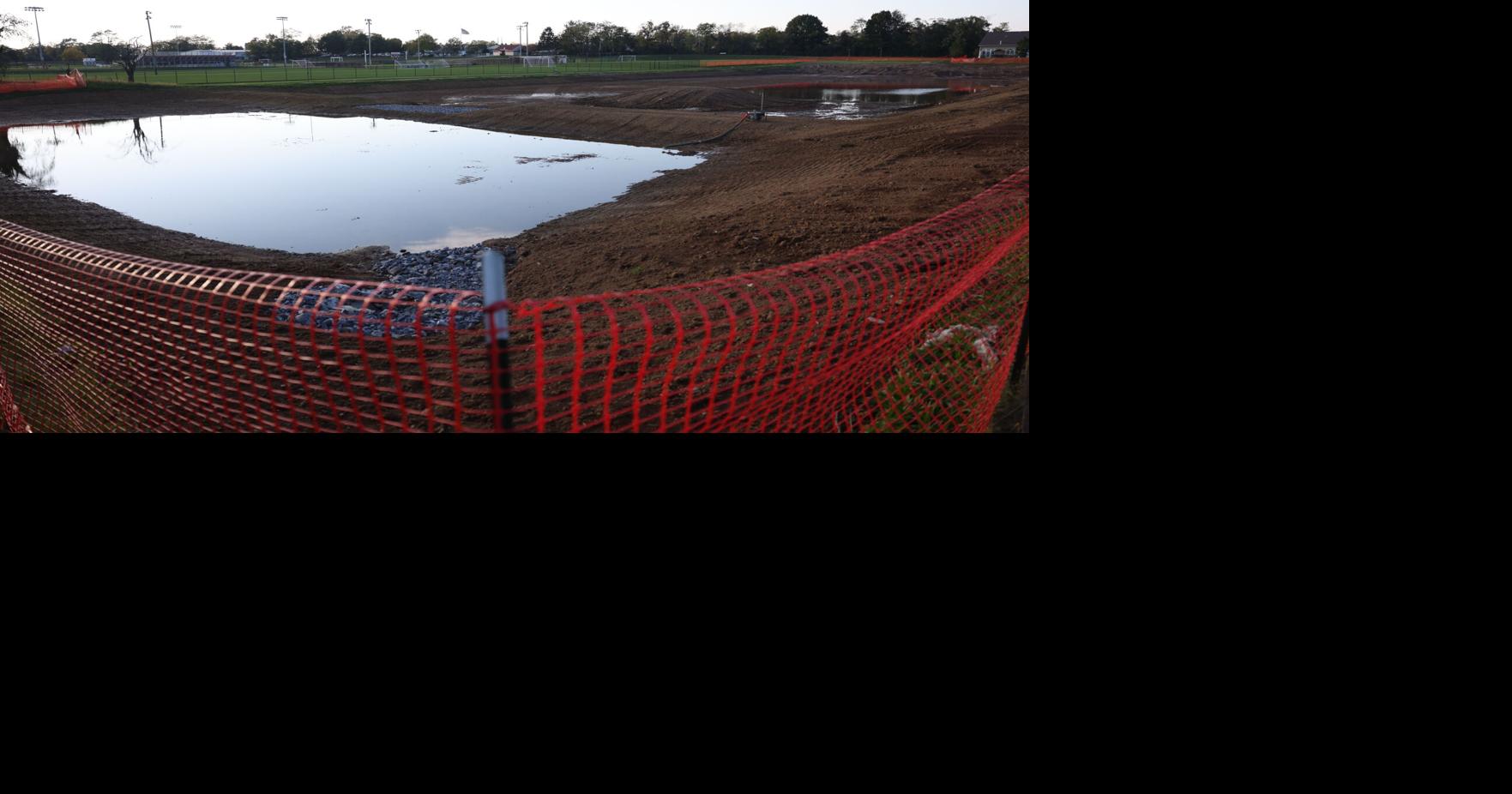 Carlisle turns dry stormwater basin into wet pond
