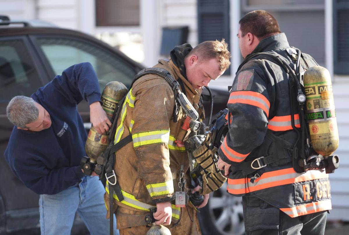 Crews battle frigid temperatures to contain house fire in Carlisle