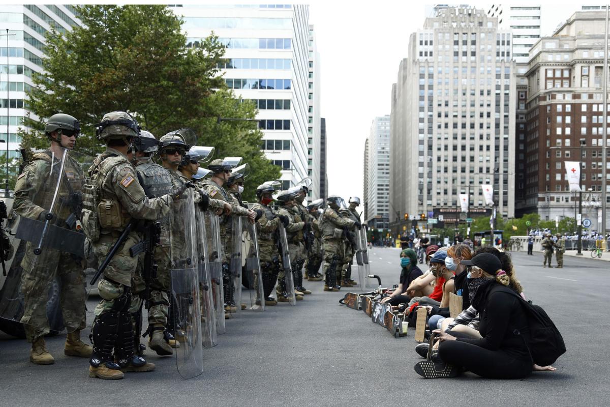 Philadelphia SWAT officer charged with pepper spraying kneeling