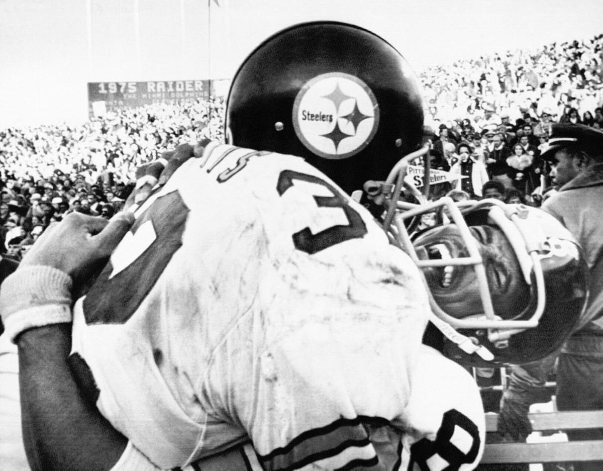 Pittsburgh Steelers Hall of Famer Franco Harris leads the Steelers fans in  the Terrible Towel wave before the start of the game against the Cincinnati  Bengals at Heinz Field in Pittsburgh on