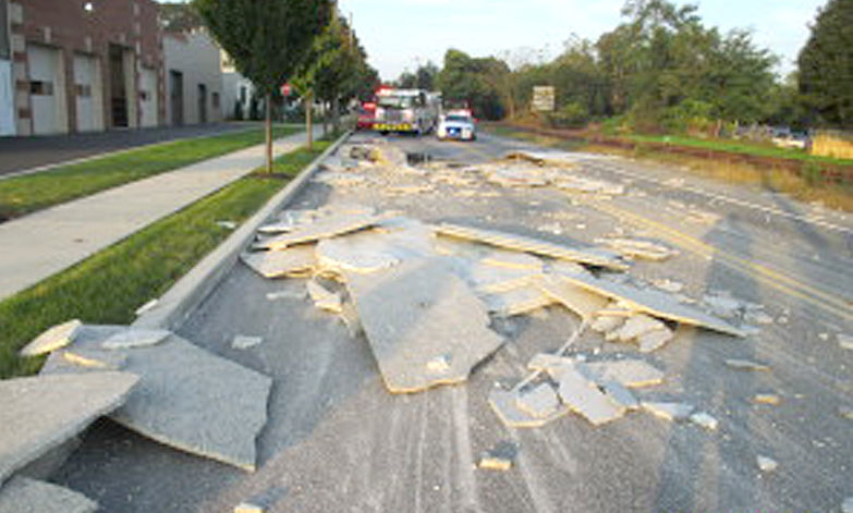 Police Truck Dumps Stone Countertops In Crash That Closes Roadway