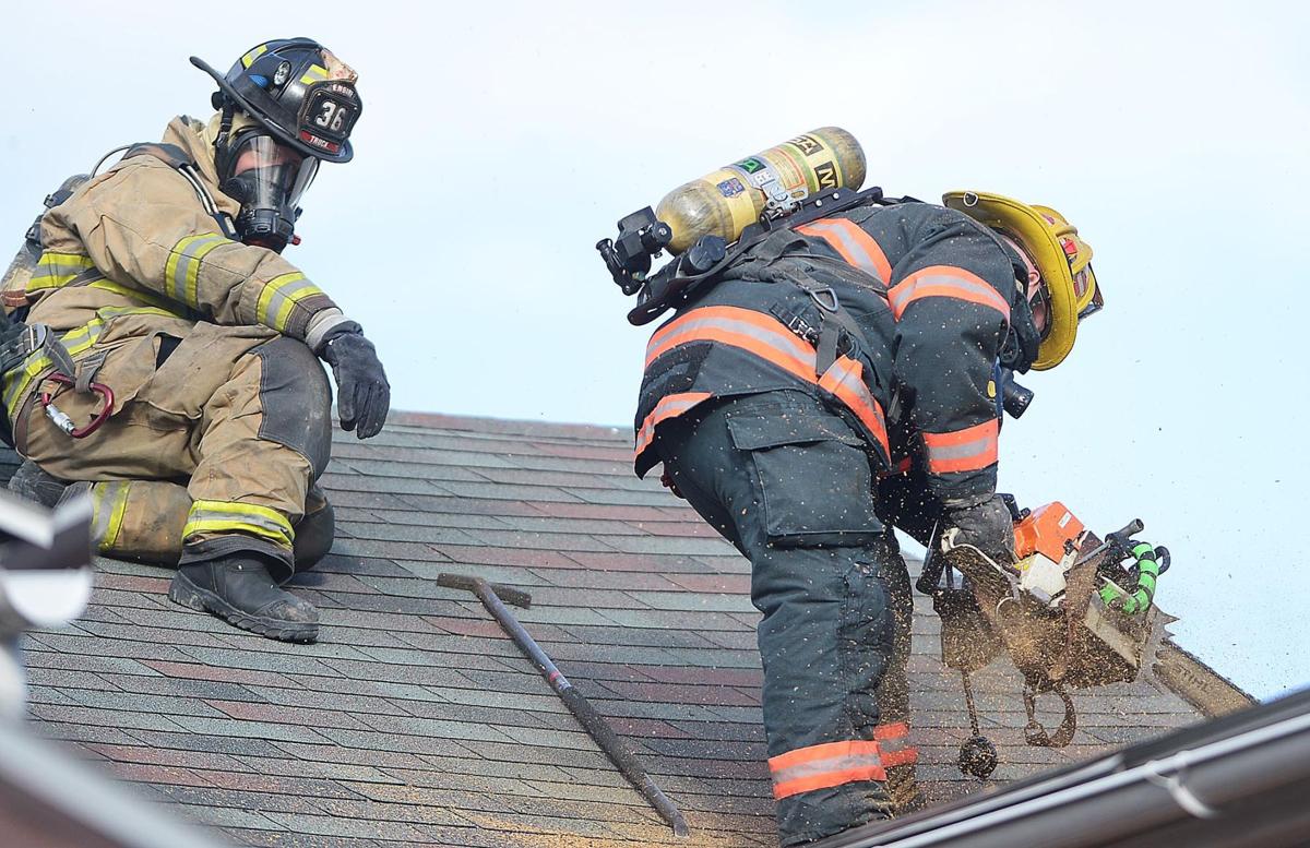 Crews battle frigid temperatures to contain house fire in Carlisle